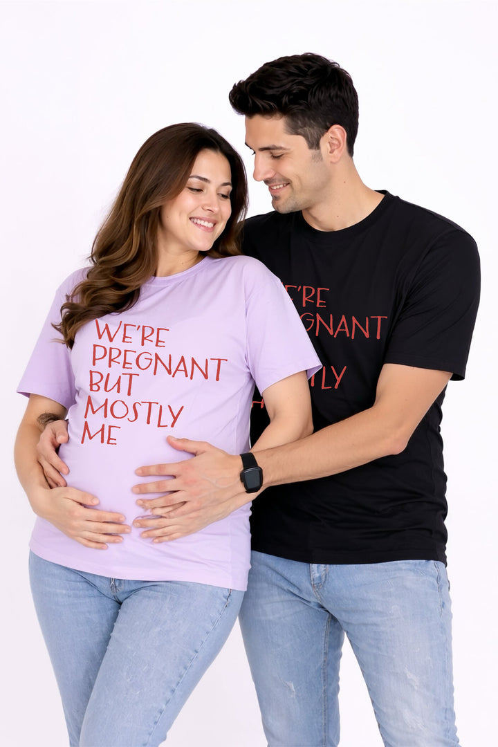 Pregnant woman wearing a purple t-shirt with text, standing next to a man wearing a black t-shirt with text.